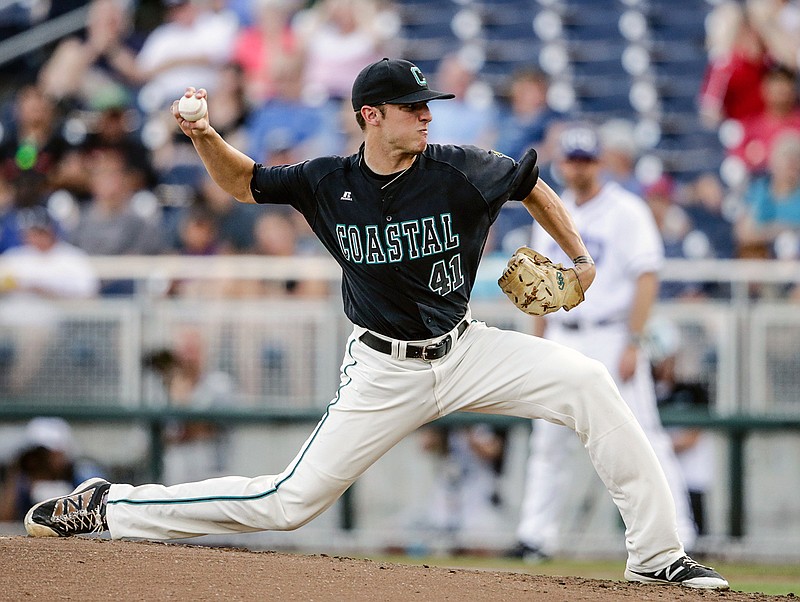 Coastal Carolina starting pitcher Andrew Beckwith throws against TCU during the first inning of an NCAA men's College World Series baseball game in Omaha, Neb., Friday, June 24, 2016. 