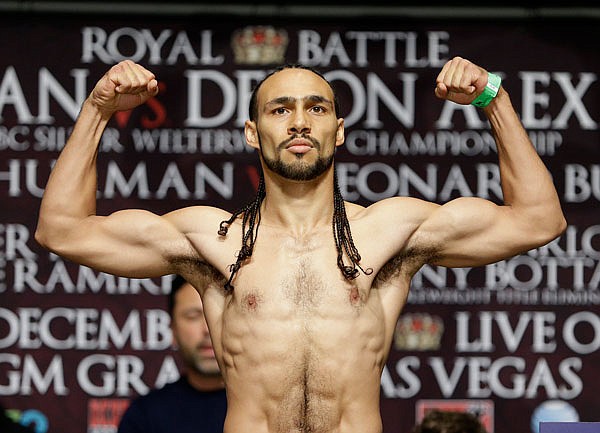 In this Dec. 12, 2014, file photo, Keith Thurman poses on a scale during a weigh-in in Las Vegas. 