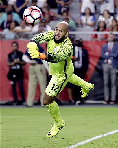 United States goalkeeper Tim Howard (12) stops a shot on goal against Colombia during the second half of the Copa America Centenario third-place soccer match at University of Phoenix Stadium, Saturday, June 25, 2016, in Glendale, Ariz.