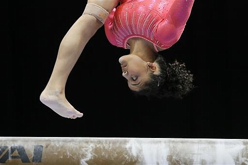 Lauren Hernandez competes on the balance beam during the U.S. women's gymnastics championships, Friday, June 24, 2016, in St. Louis. 