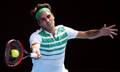  In this Jan. 26, 2016 file photo, Roger Federer of Switzerland plays a forehand return to Tomas Berdych of the Czech Republic during their quarterfinal match at the Australian Open tennis championships in Melbourne, Australia. 