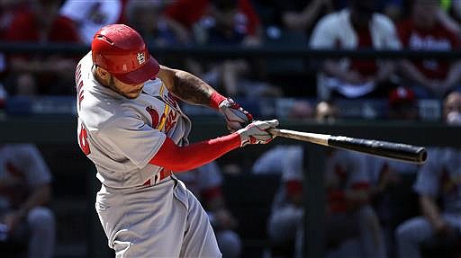 St. Louis Cardinals' Thomas Pham connects for a home run against the Seattle Mariners in the ninth inning of a baseball game Sunday, June 26, 2016, in Seattle.