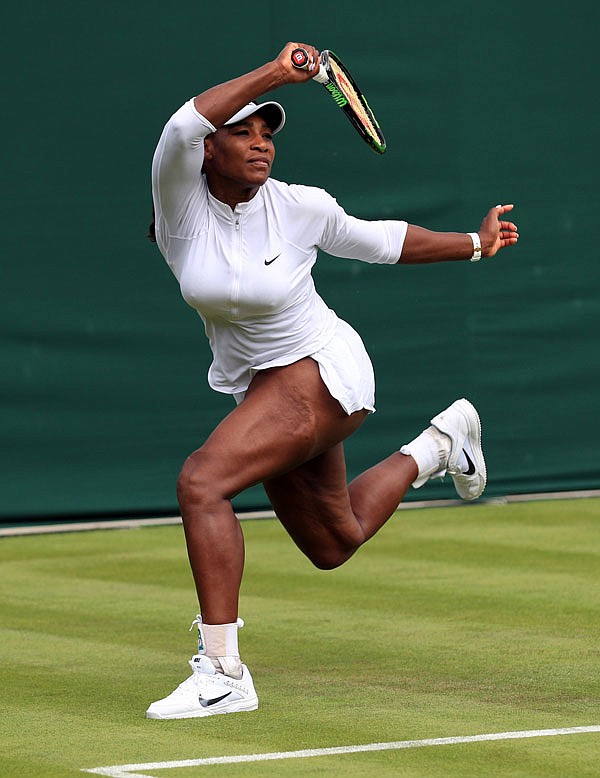 Serena Williams practices during a preview day Saturday at the All England Lawn Tennis and Croquet Club in London. The first round at Wimbledon begins today.