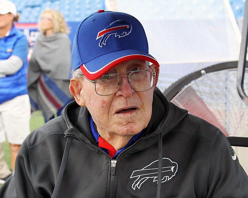 In this Sept. 13, 2015, file photo, former NFL coach Buddy Ryan watches from the sidelines before an NFL football game between the Buffalo Bills and Indianapolis Colts in Orchard Park, N.Y. Buddy Ryan, who coached two defenses that won Super Bowl titles and whose twin sons Rex and Rob have been successful NFL coaches, died Tuesday, June 28, 2016. He was 82. 