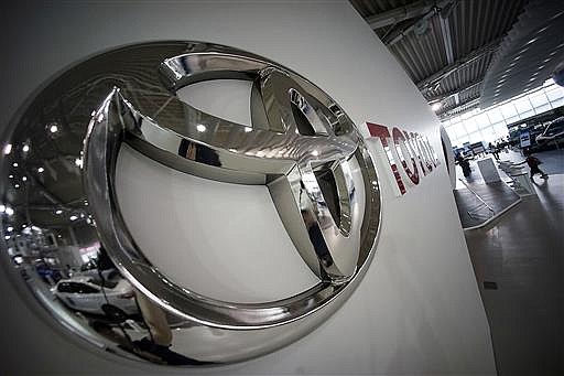 Toyota logo is seen at a Toyota showroom in Tokyo, Wednesday, June 29, 2016.