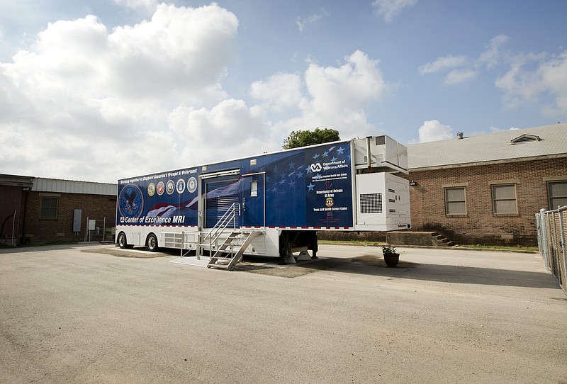 In this photo taken Aug. 4, 2014, The Center of Excellence mobile MRI machine is parked at the Olin E. Teague Veterans' Center in Temple, Texas. Nearly a decade after the Department of Veterans Affairs bought the once cutting-edge, mobile MRI system, internal investigators have concluded that research efforts at the VA Waco Center of Excellence represented "a waste of taxpayers' funds" and were an example of "poor stewardship." 