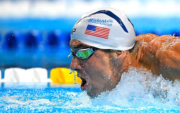 Michael Phelps swims in the men's 200-meter butterfly final at the U.S. Olympic trials Wednesday in Omaha, Neb.