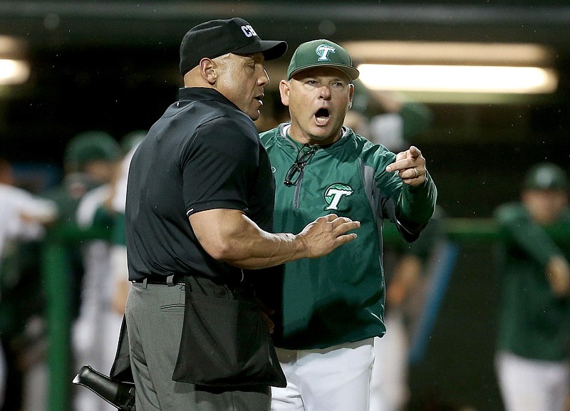 Tulane baseball coach David Pierce argues an overturned fair ball April 15 during an NCAA college baseball game against Cincinnati at Turchin Stadium in New Orleans. Texas reached an agreement Wednesday with Tulane baseball coach David Pierce to take over the Longhorns' program, a person with knowledge of the 
decision said.
