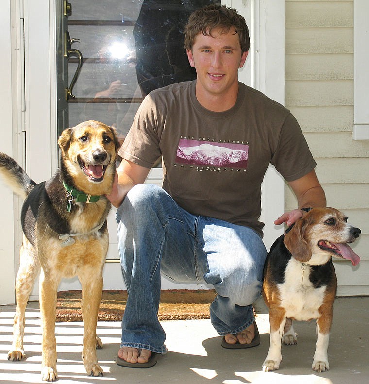 Joshua Eisenhauer poses for a photograph with his dogs. When Eisenhauer emptied 24 rounds from his 9mm handgun at police and firefighters responding to a fire in his Fayetteville, North Carolina, apartment, the former Army sergeant believed he was shooting at the Taliban bomber whose truckload of explosives blew the limbs off his friend, his defenders say. 