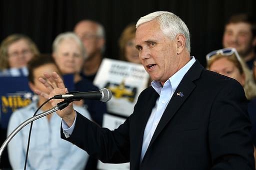 In this May 11, 2016, file photo, Indiana Gov. Mike Pence launches his campaign for re-election during an event in Indianapolis. Pence will meet with presumed Republican presidential nominee Donald Trump over the weekend, a top aide to the governor said Friday, July 1, 2016, after it was confirmed that Pence is under consideration as a vice presidential running-mate.