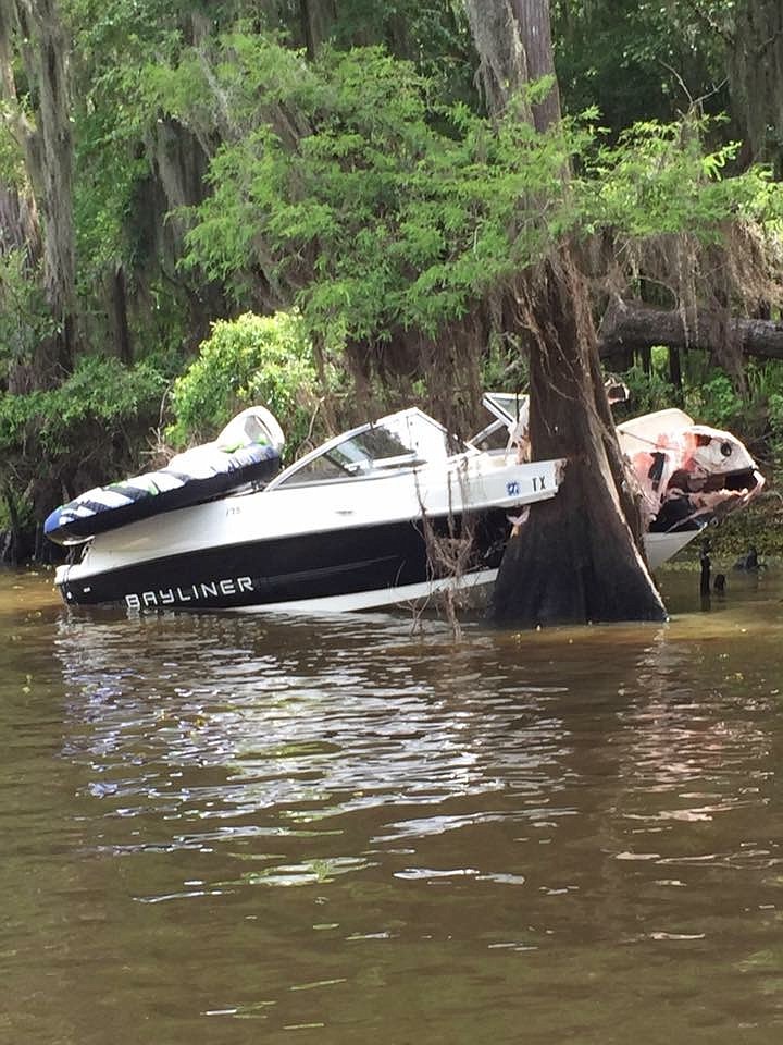 A ski boat carrying a family of seven crashed into a cypress tree around 3:30 p.m. Monday, July 4, 2016 at Caddo Lake State Park, Cass County Game Warden Jason Jones said. The boat was pulling two women on an inner tube, and the boat's driver tried making an evasive maneuver to keep the women on the inner tube from striking a tree when the accident occurred.
