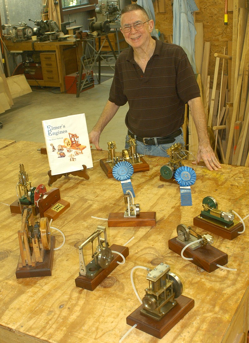 Here are a few the model steam engines in Dave Young's collection. His late father-in-law built the ones in front, while Young built the blue-ribbon winners and others.
