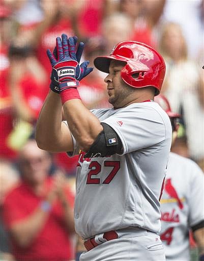 St. Louis Cardinals' Jhonny Peralta crosses home after hitting a solo home run off of Milwaukee Brewers' Chase Anderson during the second inning of a baseball game Saturday, July 9, 2016, in Milwaukee. 