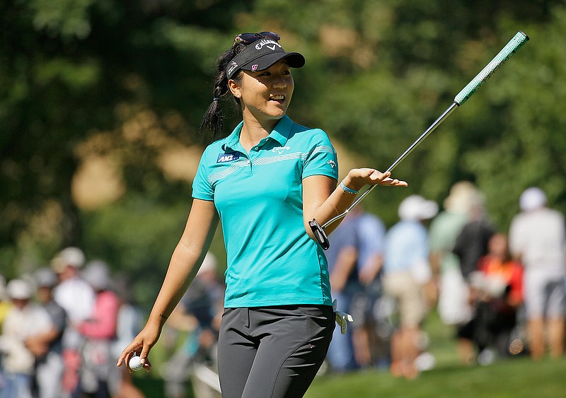 Lydia Ko, of New Zealand, walks off the sixth green after making a birdie during the second round of the U.S. Women's Open golf tournament at CordeValle Friday, July 8, 2016, in San Martin, Calif. 