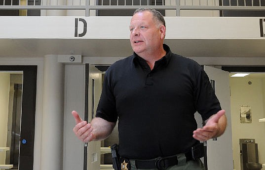 In this May 17, 2011, file photo, then Sheriff Greg White talks to news reporters at the Cole County Jail.