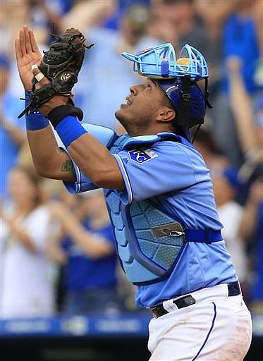 Kansas City Royals catcher Salvador Perez celebrates after a baseball game against the Seattle Mariners at Kauffman Stadium in Kansas City, Mo., Saturday, July 9, 2016.