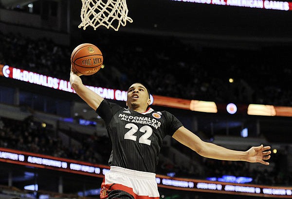 Jayson Tatum, from Chaminade High School in St. Louis, dunks during the McDonald's All-American boys basketball game earlier this year in Chicago.