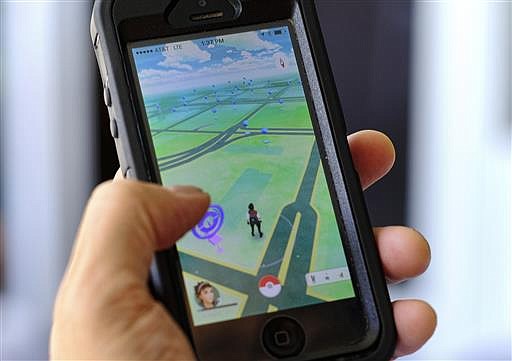 Pokemon Go is displayed on a cell phone in Los Angeles on Friday, July 8, 2016. 