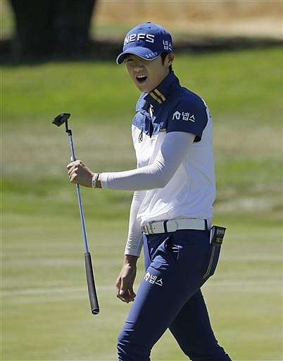 Sung Hyun Park, of South Korea, reacts after missing a birdie putt on the second green during the third round of the U.S. Women's Open golf tournament at CordeValle Saturday, July 9, 2016, in San Martin, Calif. 