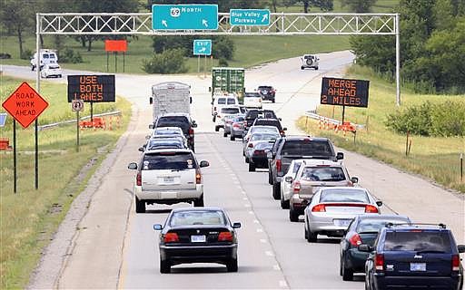 Drivers head north on U.S. 69 into a construction zone in Overland Park, Kan., Thursday, July 7, 2016.