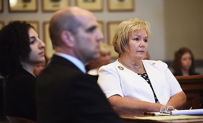 With two of her attorneys seated at left, Pat Rowe Kerr, at right, listens to Judge Jon Beetem's jury instruction Monday, July 11, 2016 in her case against Larry Kay in Cole County Circuit Court. 