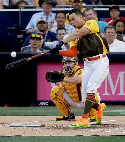 Giancarlo Stanton of the Marlins connects Monday during the All-Star Home Run Derby in San Diego.