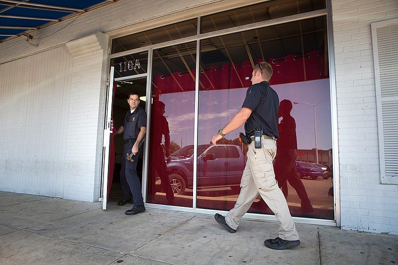 Texarkana, Texas, police search a gambling house Thursday morning, July 14, 2016, in Oaklawn Village Shopping Center. TTPD raided the storefront operation after undercover officers investigated for two weeks.