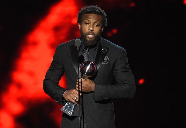 Eric Berry of the Chiefs, accepts the award for best comeback athlete Wednesday at the ESPY Awards at the Microsoft Theater in Los Angeles.