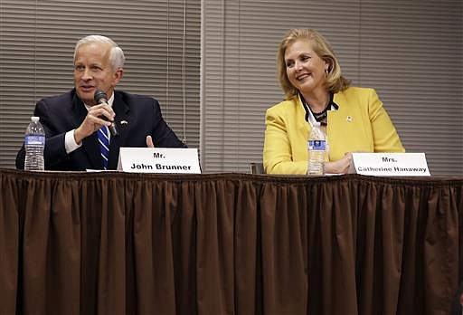 In this Nov. 3, 2015, file photo, Missouri Republican gubernatorial candidates, businessman John Brunner, left, and former Missouri House Speaker Catherine Hanaway participate in a forum in Jefferson City, Mo. Brunner and Hanaway along with other Republican candidates, former Navy SEAL Eric Greitens and Lt. Gov. Peter Kinder are scheduled to debate Wednesday night, July 6, 2016, in St. Louis.