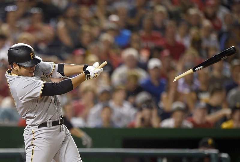 Pittsburgh Pirates' Jung Ho Kang, of South Korea, breaks his bat as he grounds out during the seventh inning of a baseball game against the Washington Nationals, Friday, July 15, 2016, in Washington. The Nationals won 5-1. 