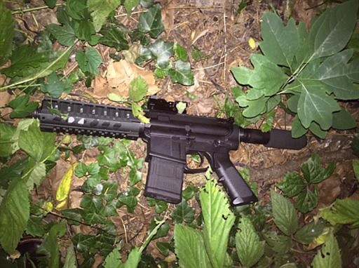 This photo provided by the Baltimore Police shows a gun recovered from a shooting scene in Baltimore, Thursday, July 14, 2016. Baltimore police officers responding to the sound of gunshots near an apartment building fatally shot a man who fired at them with an AR-15-style rifle, authorities said early Friday.