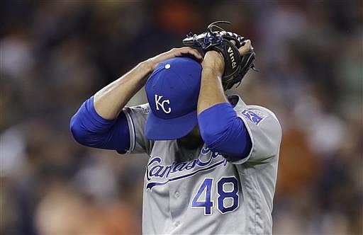 Kansas City Royals relief pitcher Joakim Soria reacts as he walks to the dugout after giving up a two-run single to Detroit Tigers designated hitter Victor Martinez (41) during the seventh inning of a baseball game, Friday, July 15, 2016 in Detroit. 