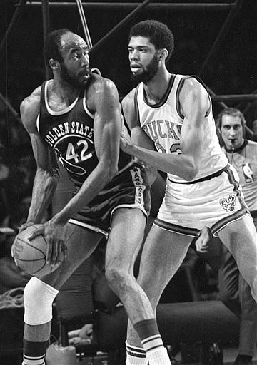 In this March 30, 1973, file photo, Nate Thurmond of the Golden State Warriors (42) looks back at Kareem Abdul-Jabbar of the Milwaukee Bucks before making his move toward the basket during NBA playoff action at Milwaukee, Wis. Thurmond, a Hall of Fame center and longtime Golden State Warrior, died Saturday, July 16, 2016, after a short battle with leukemia, the team announced. He was 74.