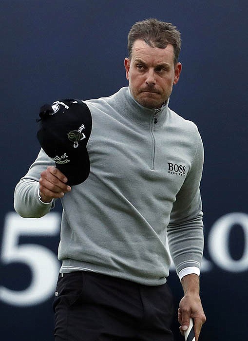 Henrik Stenson acknowledges the crowd after finishing his round Saturday in the British Open at the Royal Troon Golf Club in Troon, Scotland.