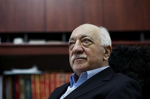 In this March 15, 2014 file photo, Turkish Muslim cleric Fethullah Gulen, sits at his residence in Saylorsburg, Pa. A lawyer for the Turkish government, Robert Amsterdam, said that "there are indications of direct involvement" in the Friday, July 15, 2016, coup attempt of Fethullah Gulen, a Muslim cleric who is living in exile in Pennsylvania.