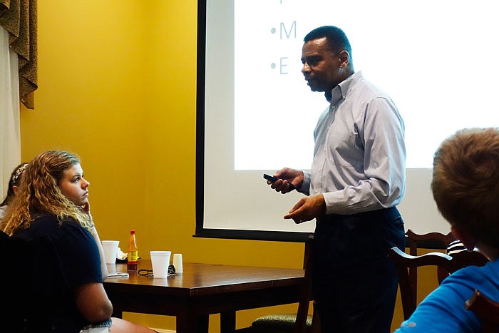 Retired Maj. Gen. Byron Bagby speaks to students Monday night at Westminster College about the state of the world. He was one of the speakers for a five-day seminar where high school students could earn college credit in security studies.