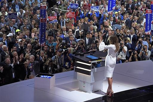 Melania Trump, wife of Republican Presidential Candidate Donald Trump waves to the delegates after her speech during the opening day of the Republican National Convention in Cleveland, Monday, July 18, 2016.