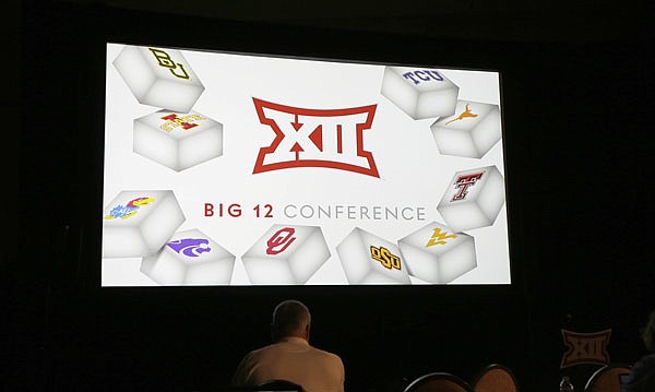 The Big 12 logo is shown Tuesday during the Big 12 college football media days in Dallas.
