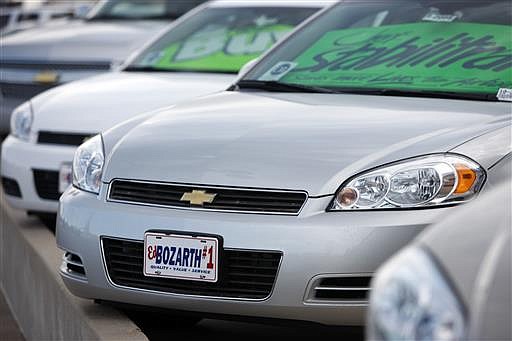  In this April 11, 2010, file photo, Chevrolet 2010 Impalas sit at a Chevrolet dealership in Aurora, Colo. 