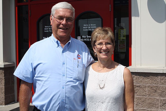Ron and Cindy Atkinson stand in front of Gasper's Truck Stop  in Kingdom City on Tuesday.