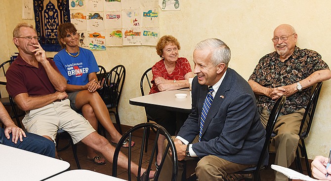 John Brunner, second from right, stopped at Coffee Zone on Friday for a meet and greet with the public. Mary Ann and Tom Weaver, seated at the table with Brunner, were two of several people who wanted to hear what the Republican gubernatorial candidate had to say.