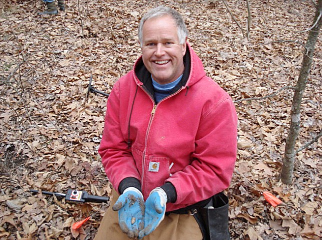 Bryant Liddle shows off some finds at the 2014 Moore's Mill battlefield dig.