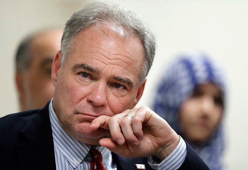 Sen. Tim Kaine, D-Va., listens to community leaders at a roundtable discussion on religious freedom with the regional interfaith community at All Dulles Area Muslim Society (ADAMS) Mosque in Sterling, Va., Thursday, July 21, 2016. 