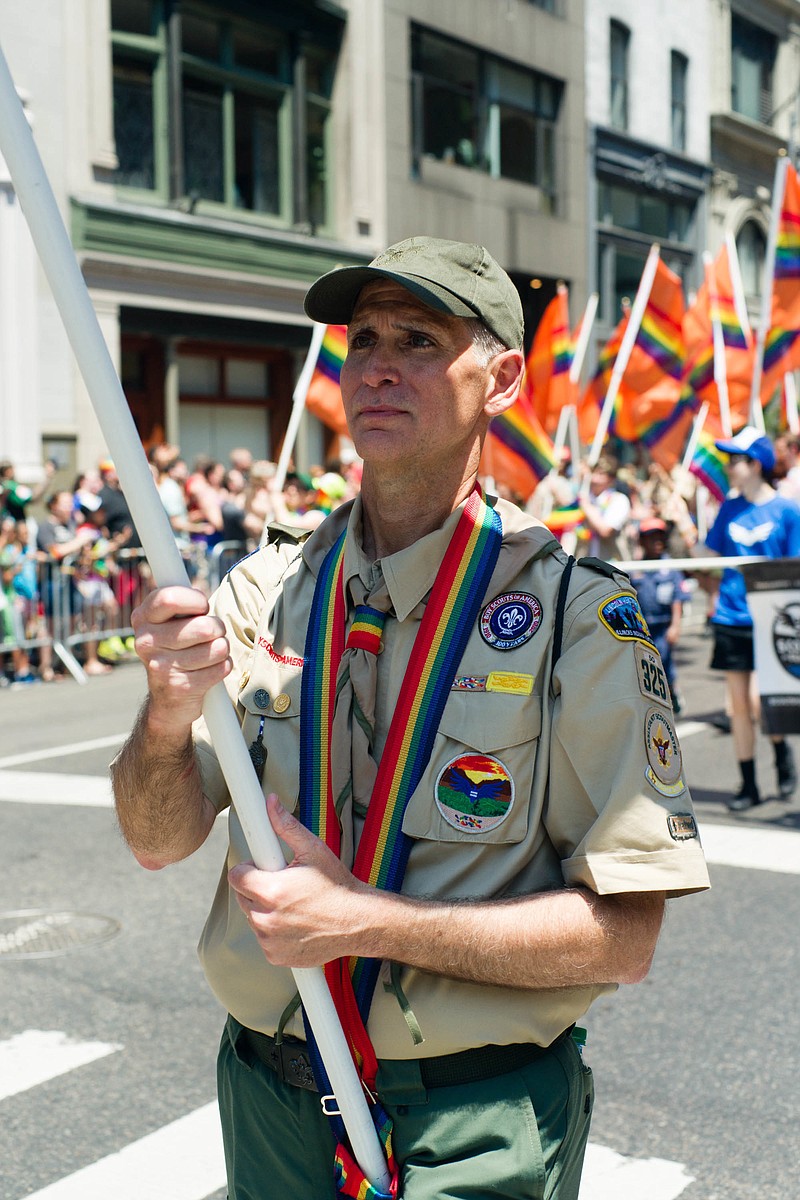 This Sunday, June 26, 2016 photo provided by Brian Gorman shows Greg Bourke from Louisville, Ky., marching in the gay pride parade in New York. Bourke went public with details of how the Archdiocese of Louisville refused to reinstate him as a leader of a Catholic-sponsored Scout troop despite the Boy Scouts of America National Executive Board's decision to end a long-standing blanket ban on participation by openly gay adults. (