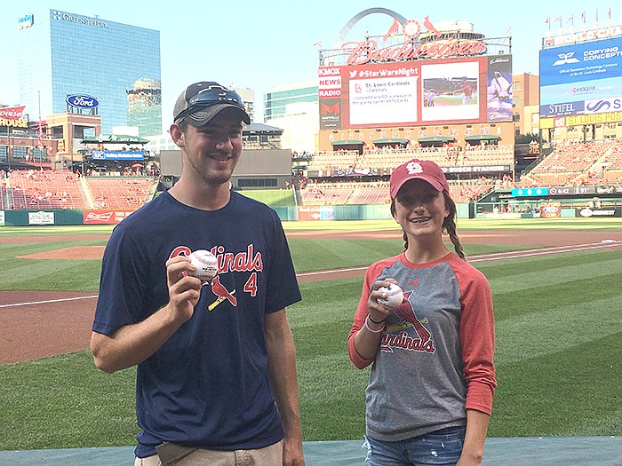 Darby Nolting, eighth-grader at Linn Middle School, and Trevor Wieberg, senior at Fatima High School, were grand prize winners in Vitae Foundation's 2016 Essay Contest on Life Issues. Each threw a ceremonial first pitch before the start of the July 20 St. Louis Cardinals game in St. Louis.