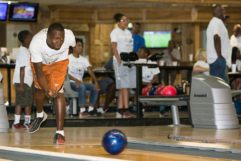 Oscar Brown bowls Sunday, July 24, 2016 at Holiday Bowl on State Line Avenue in Texarkana, Ark., as part of the Strikes for Scholars fundraiser for the Grace Fort Gouldsby Scholarship Foundation. The foundation provides college scholarship and proves mentorship to area students.