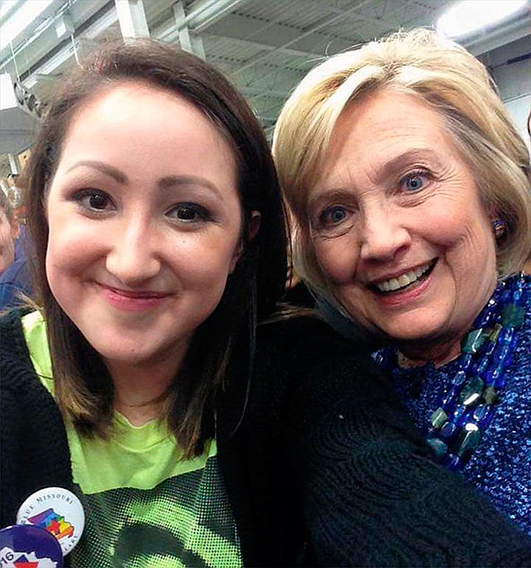 Rachel Gonzalez, left, poses for a selfie with Democratic presidential candidate Hillary Clinton at a 2015 campaign rally in St. Louis. 