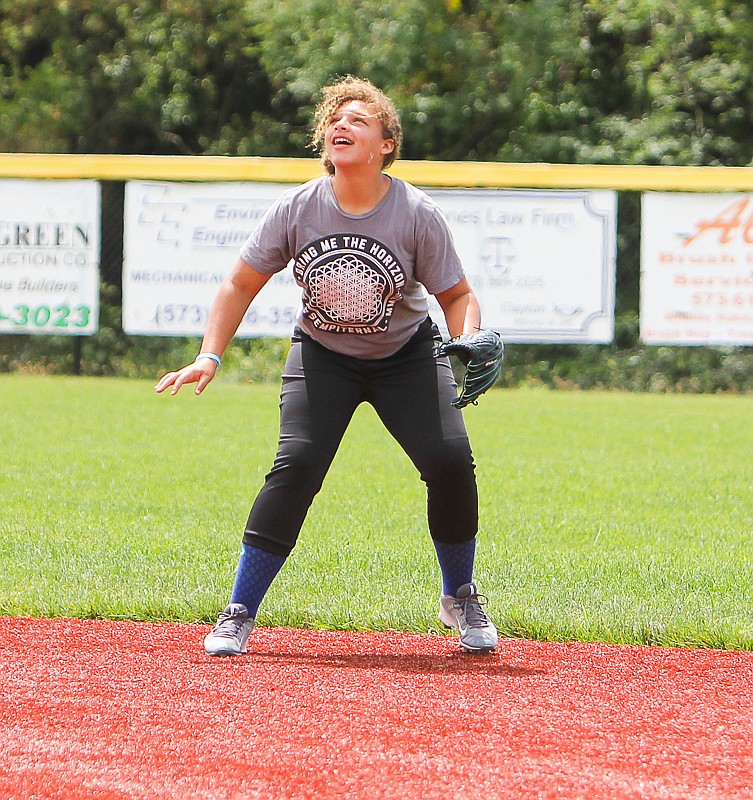 KaLynn Irey looks to catch a pop fly during camp on Friday.