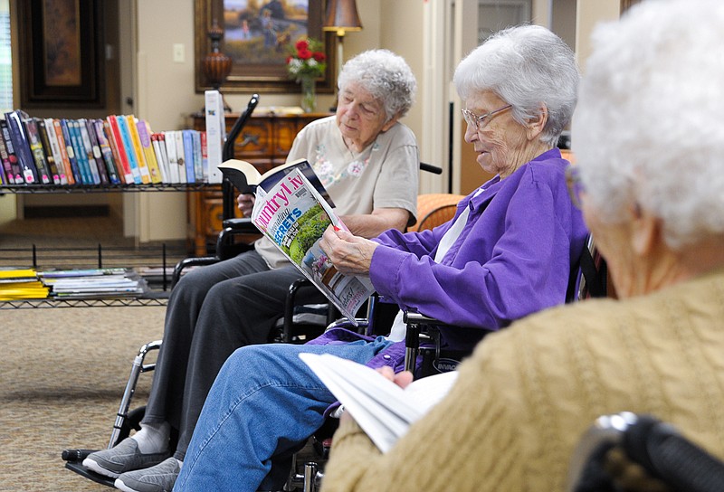 California Care Center residents Marie Kobel, Alma Chamber and Betty Howard enjoy checking out new books every two weeks through the Moniteau County Library @ Wood Place senior delivery program.