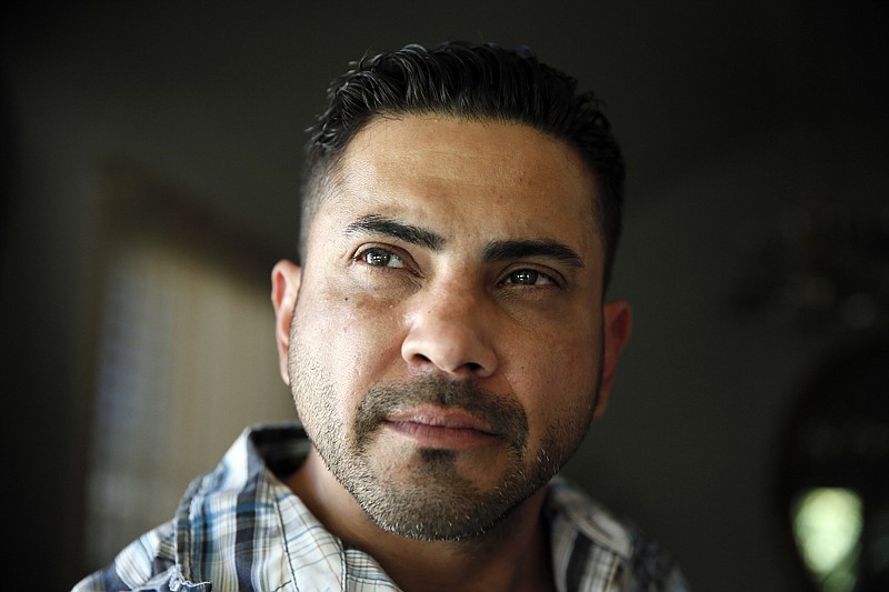 Marcus Calvillo, shown at left on Oct. 15, 2015, in Grand Prairie Texas, had his life ruined by Fernando Neave-Ceniceros, a convicted sex offender who stole his identity. Calvillo can now repair the havoc left from the decades-long ordeal after a federal court in Kansas  sentenced Neave-Ceniceros to a year and a day for stealing his identity. 
